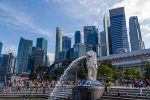 Singapore's Merlion with high rise financial institutes in the background